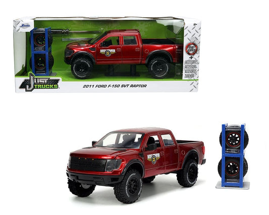 2011 Ford Ford Raptor Mickey Thompson w/ Spare Rack & Wheels 1:24